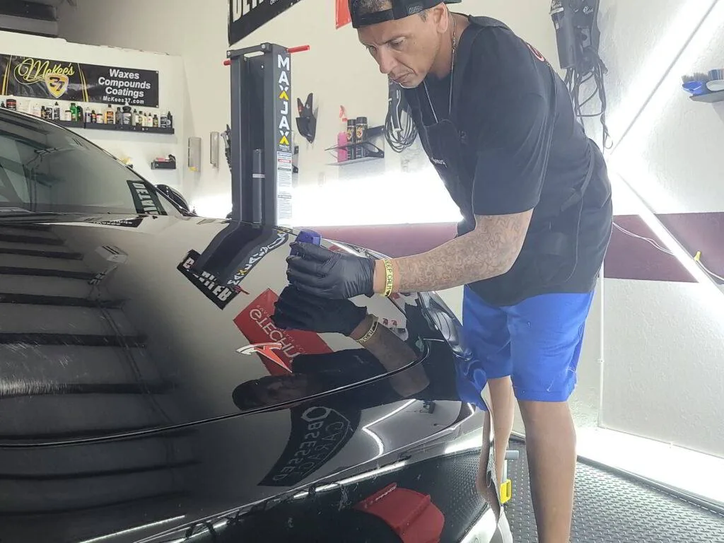 black car tail paint correction checking tim's pro auto spa wildwood fl